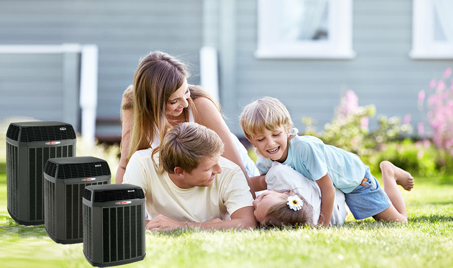 Family Laying on Grass with Air Conditioner Units Next to Them | Air Conditioning Services: Air Conditioning Replacements, Air Conditioning Repair and More for Islip, NY and the Surrounding Areas 