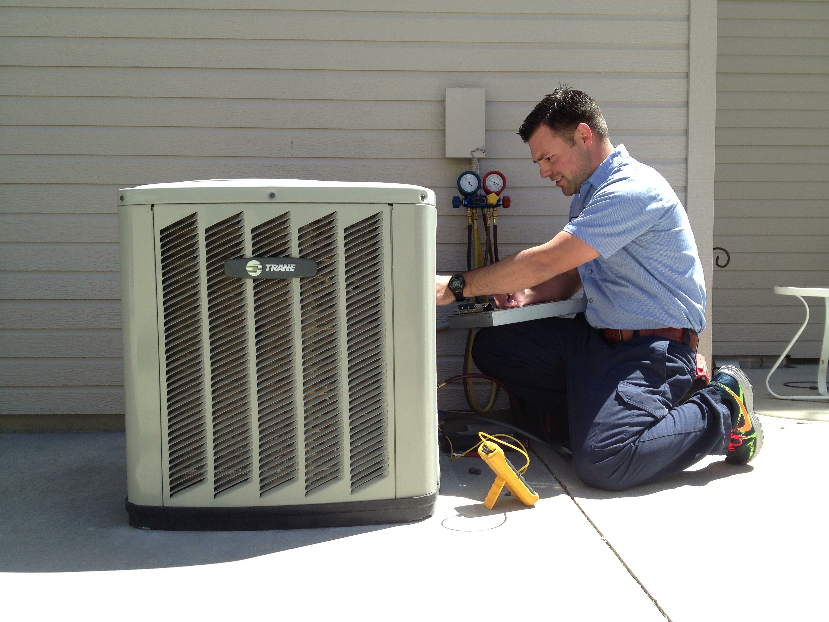 Technician working on a Air Conditioning in Riverhead